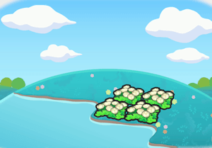 Flauschige Blumen am Wasser